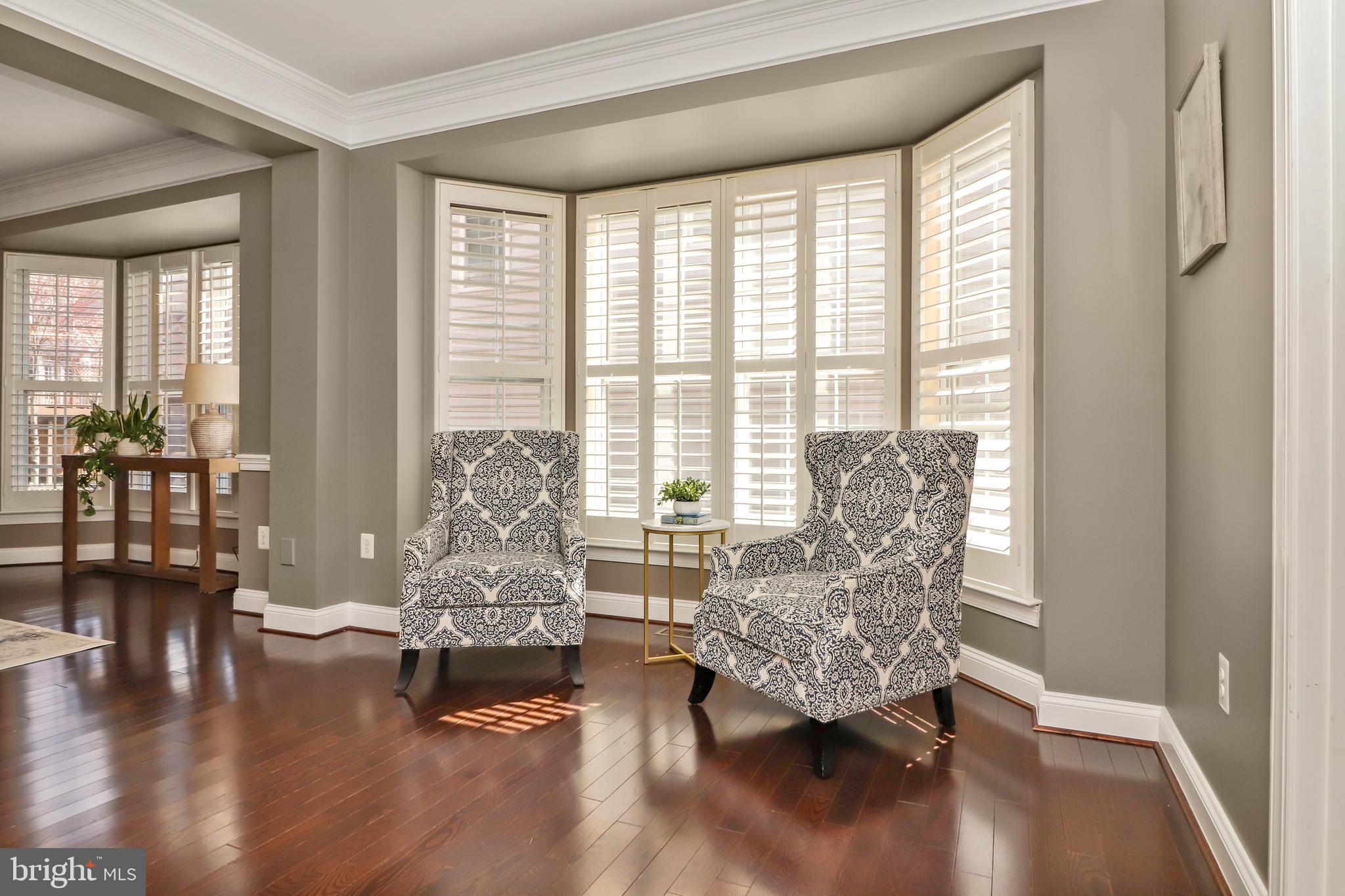 22773 Highcrest Circle Brambleton, VA 20148 - Photo 15 of 40 a living room with furniture and wooden floor