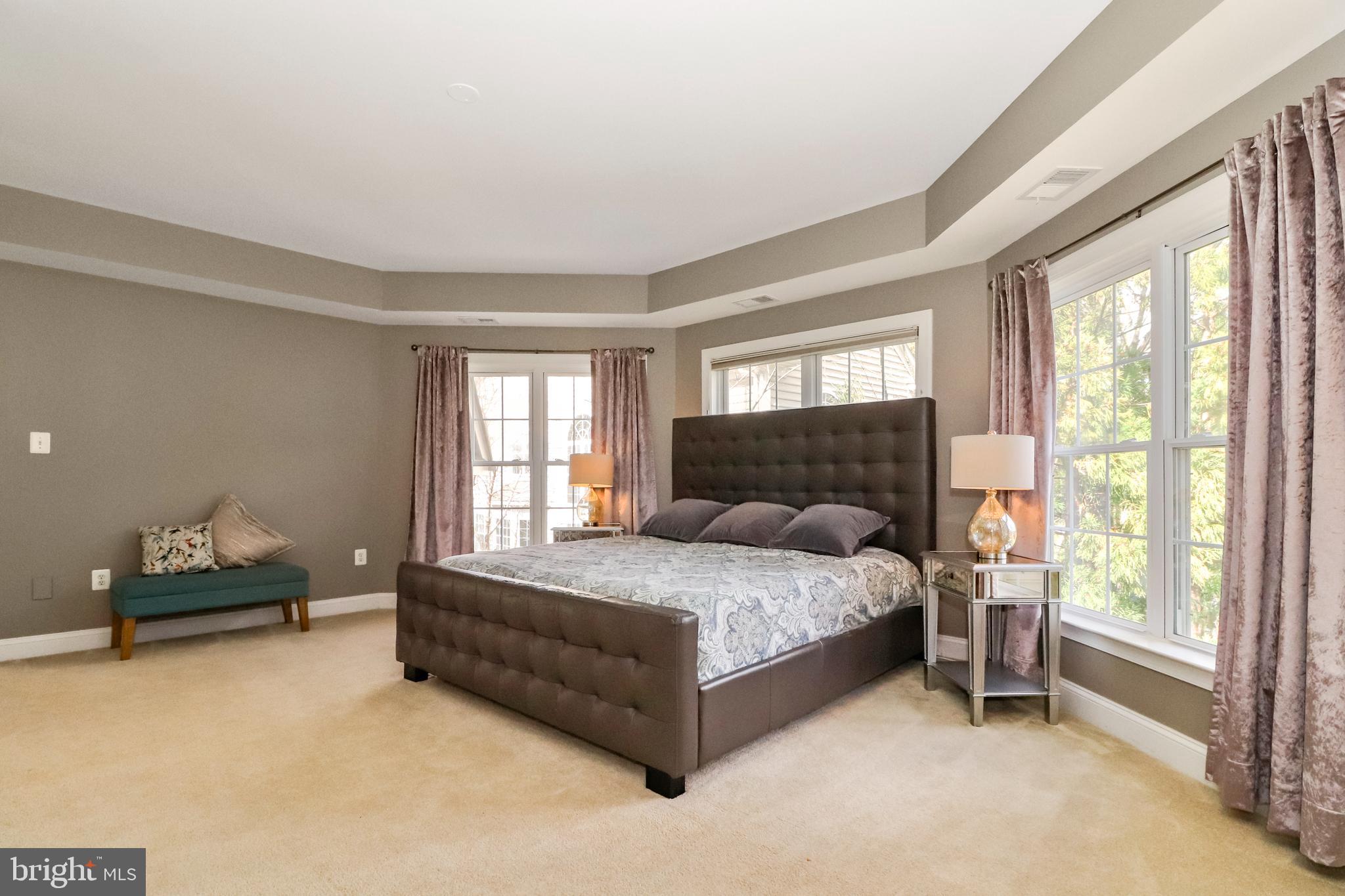 22773 Highcrest Circle Brambleton, VA 20148 - Photo 18 of 40 a bedroom with a bed and a window