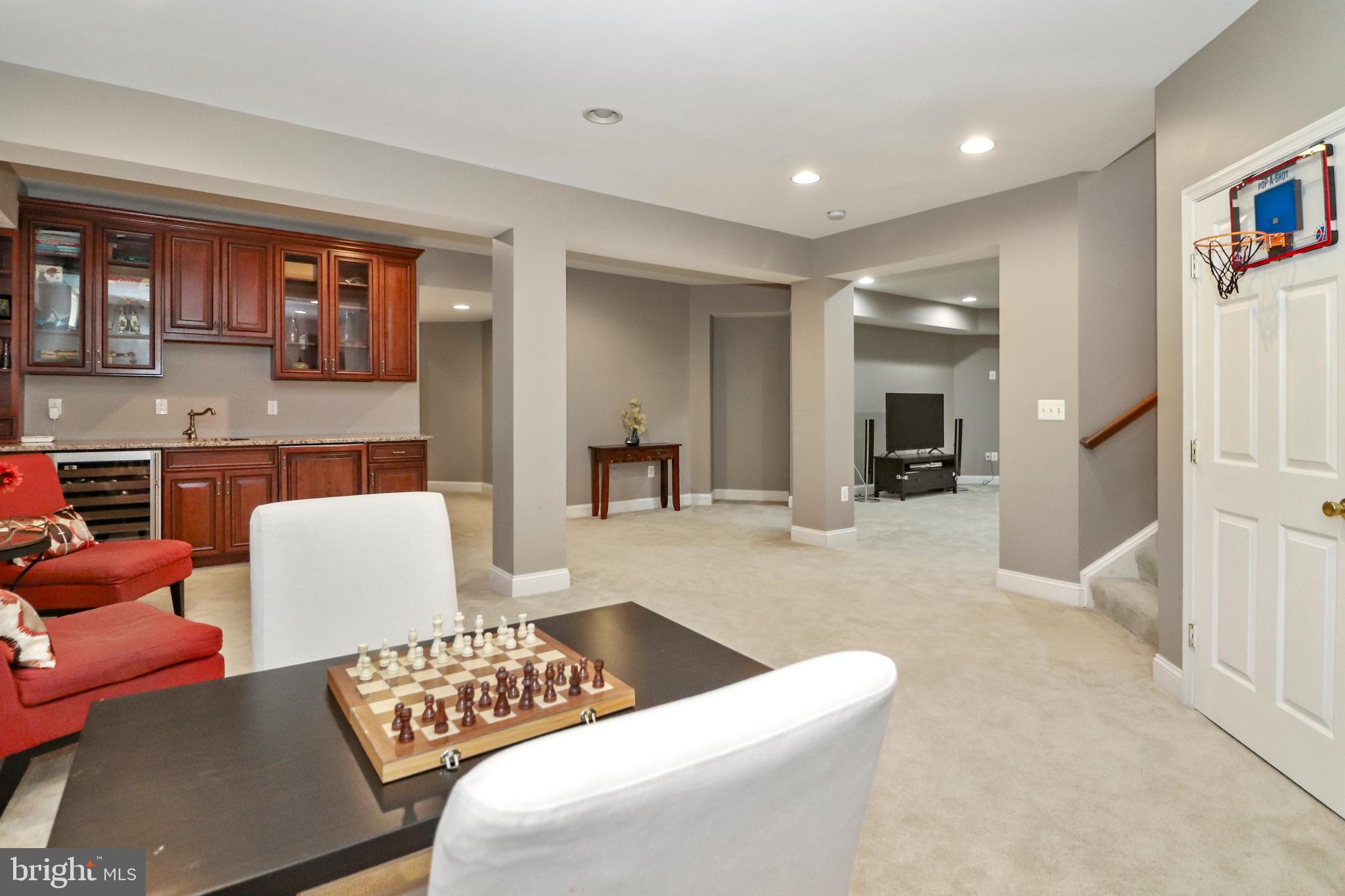 22773 Highcrest Circle Brambleton, VA 20148 - Photo 28 of 40 a living room with furniture and a couch