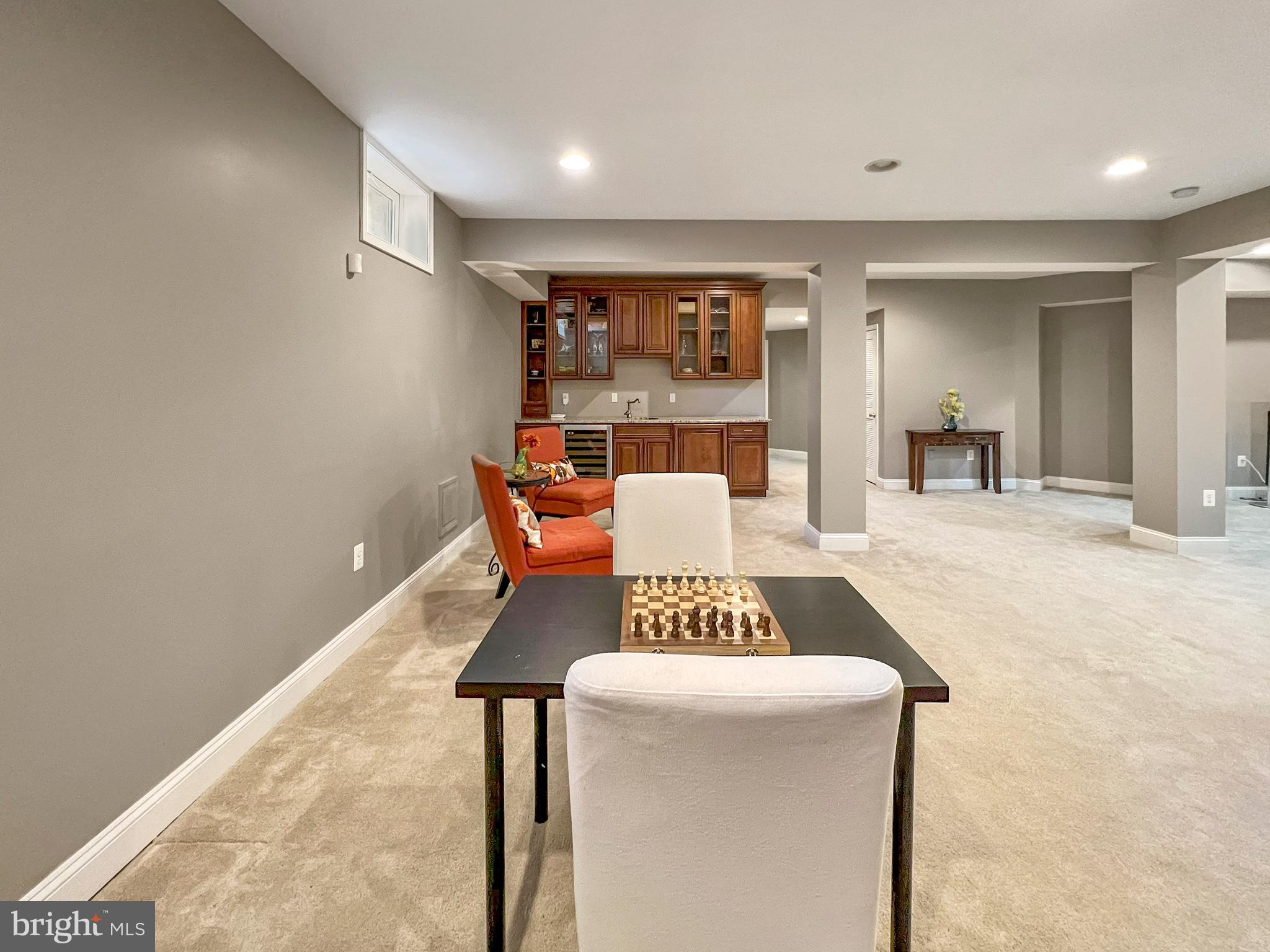 22773 Highcrest Circle Brambleton, VA 20148 - Photo 29 of 40 a living room with furniture and a large window