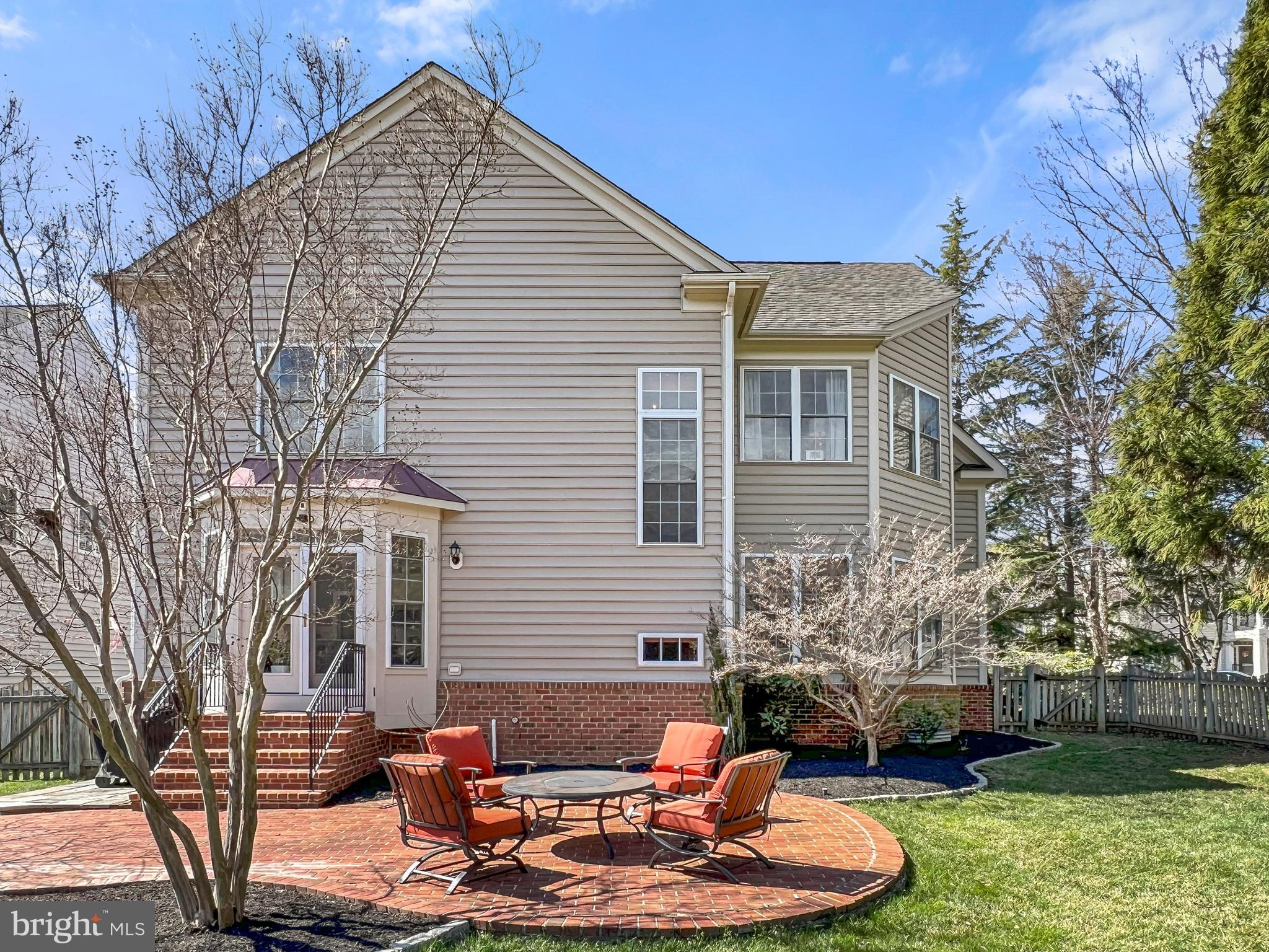22773 Highcrest Circle Brambleton, VA 20148 - Photo 33 of 40 a backyard of a house with yard fire pit and outdoor seating
