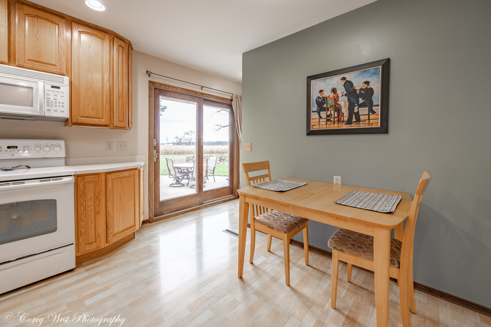 6790 Cherry Valley Road Kingston, IL 60145 - Photo 11 of 44 a view of a kitchen with a table and chairs
