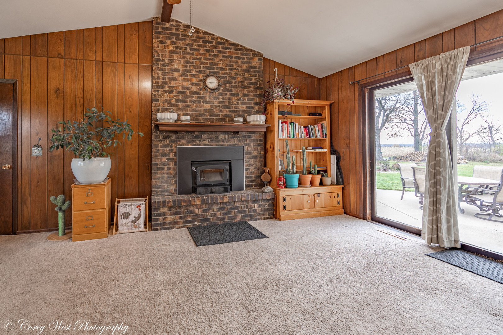 6790 Cherry Valley Road Kingston, IL 60145 - Photo 15 of 44 a living room with furniture and a fireplace
