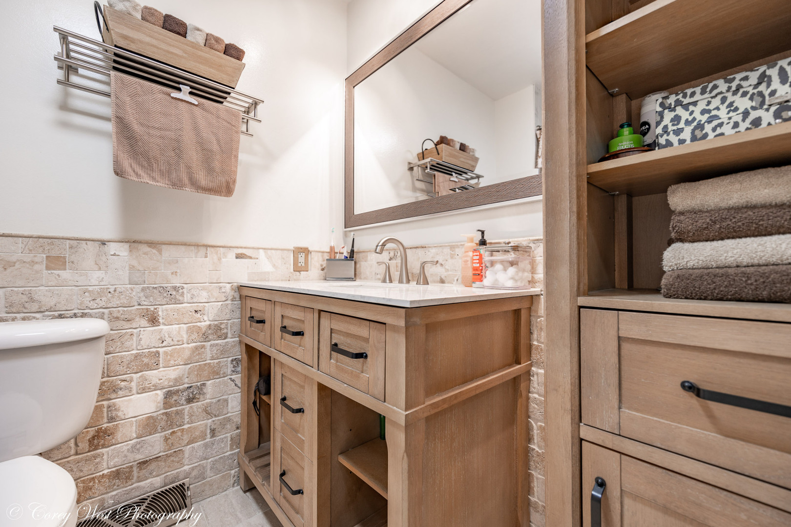 6790 Cherry Valley Road Kingston, IL 60145 - Photo 29 of 44 a bathroom with a sink toilet and vanity