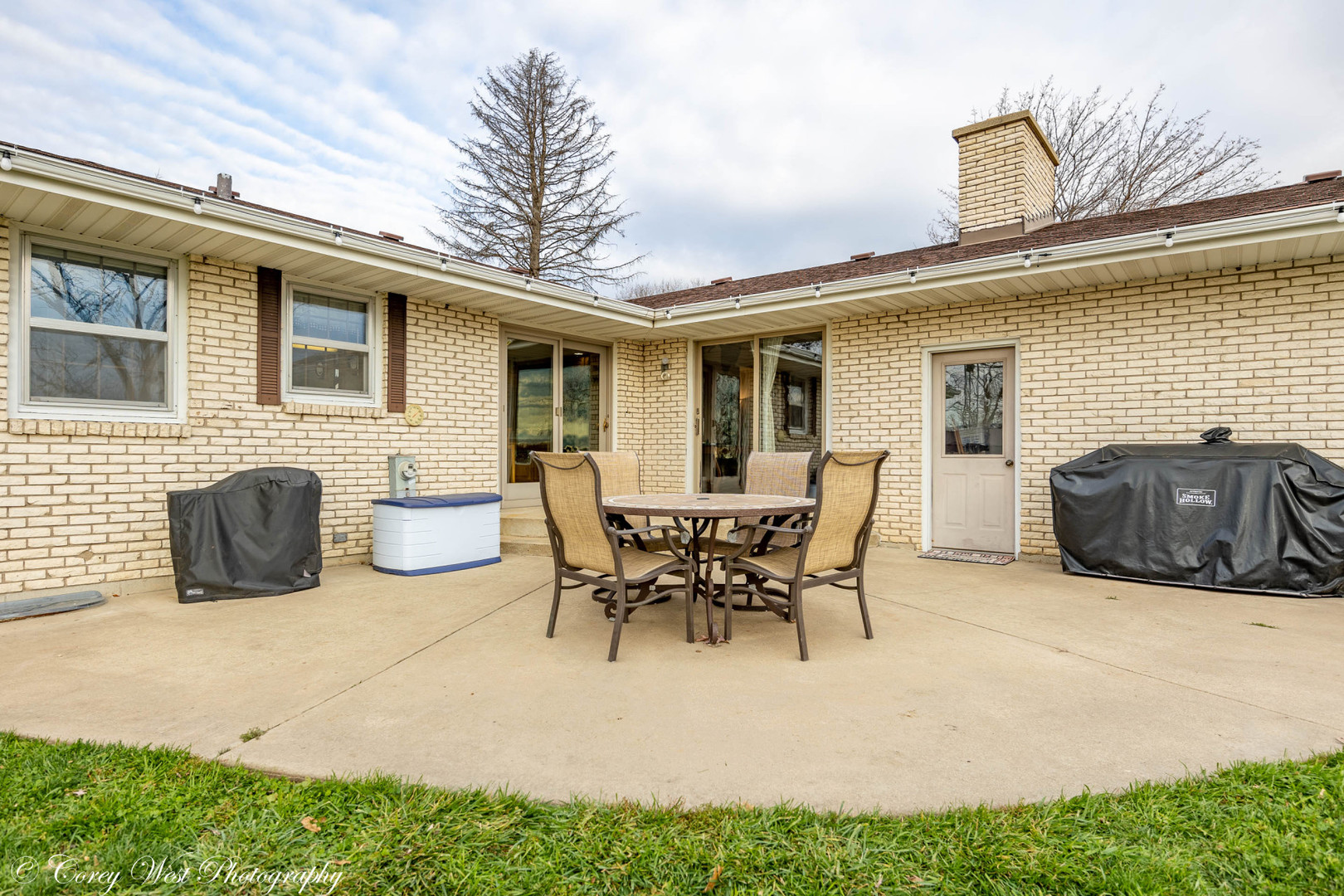 6790 Cherry Valley Road Kingston, IL 60145 - Photo 31 of 44 a view of a patio with table and chairs and potted plants