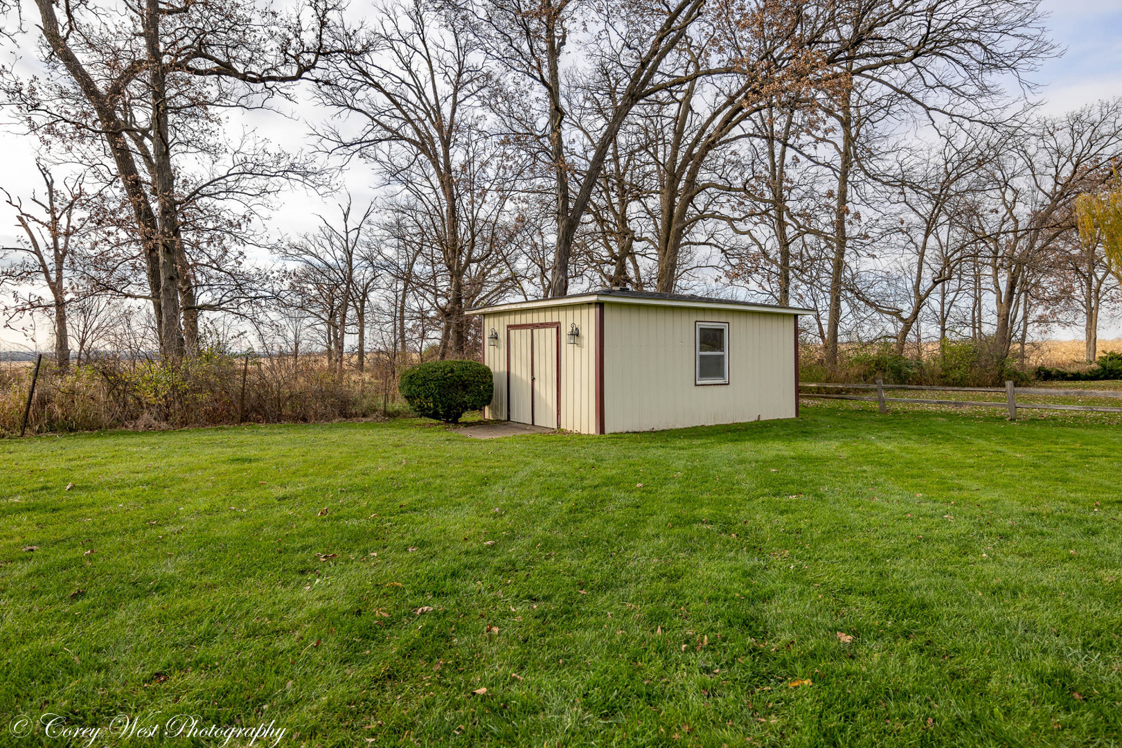 6790 Cherry Valley Road Kingston, IL 60145 - Photo 36 of 44 a view of a backyard with large trees