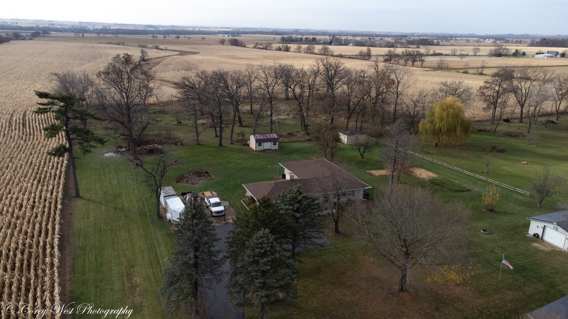 6790 Cherry Valley Road Kingston, IL 60145 - Photo 39 of 44 a view of a lake with a yard and mountain view