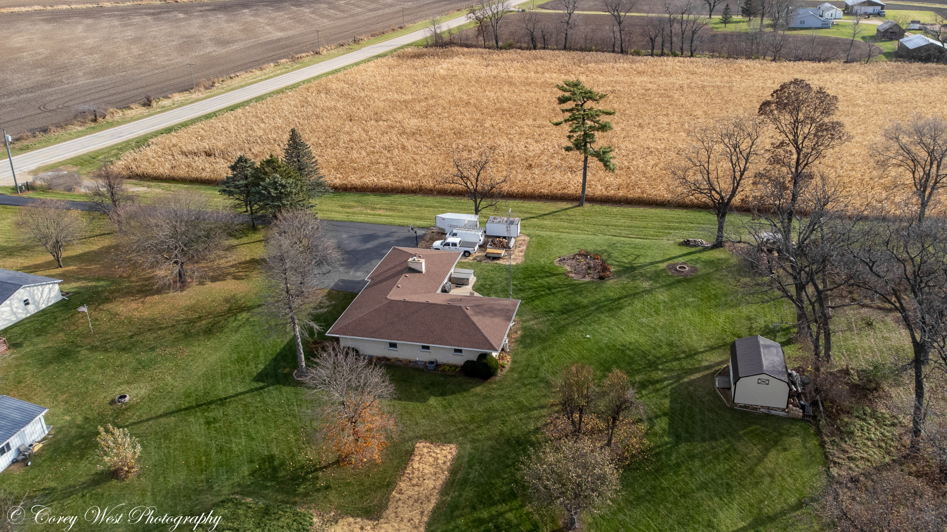 6790 Cherry Valley Road Kingston, IL 60145 - Photo 44 of 44 a view of a garden with a lake
