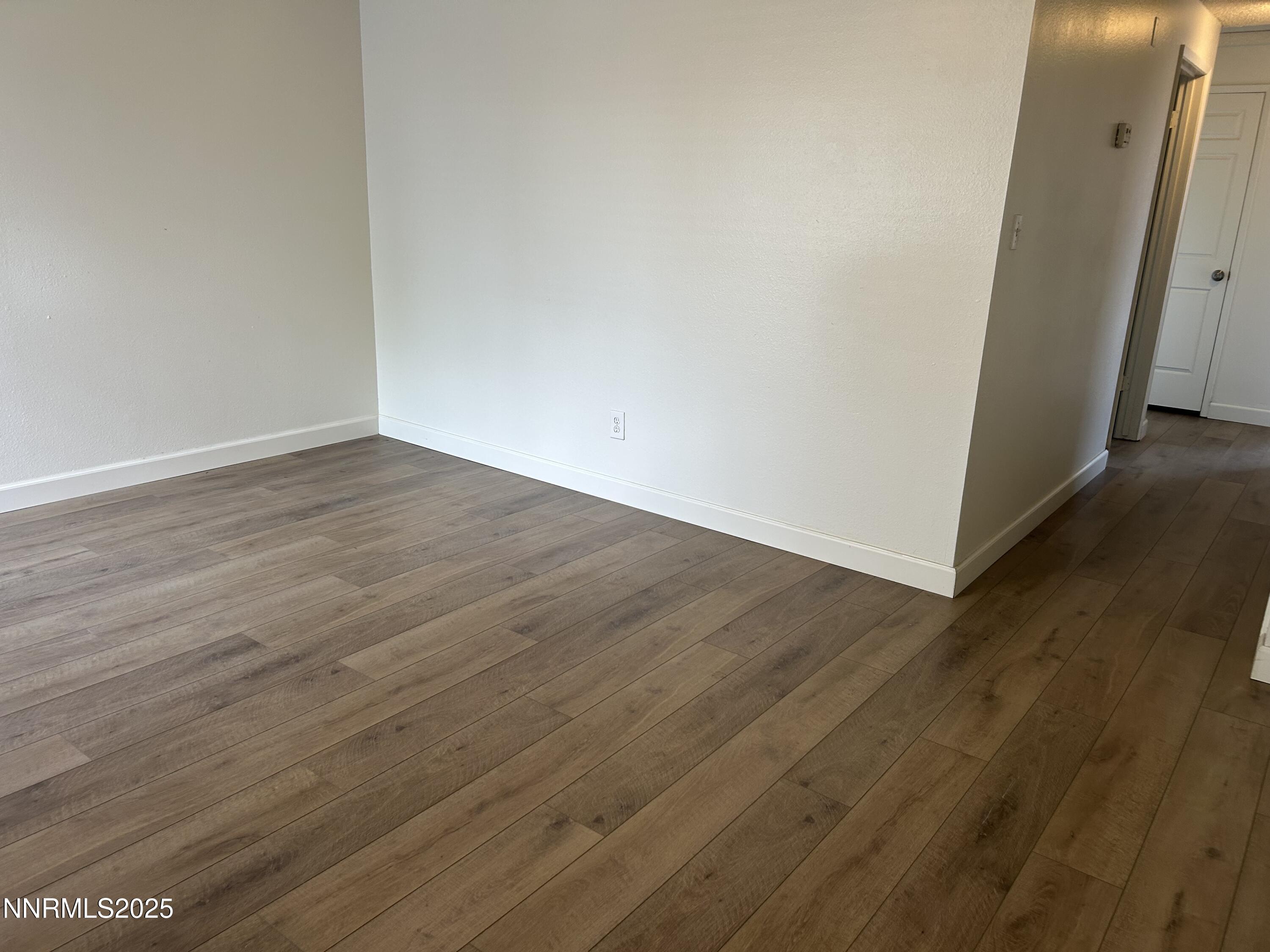 6780 Peppermint Drive Reno, NV 89506 - Photo 12 of 16 a view of a small space with wooden floor