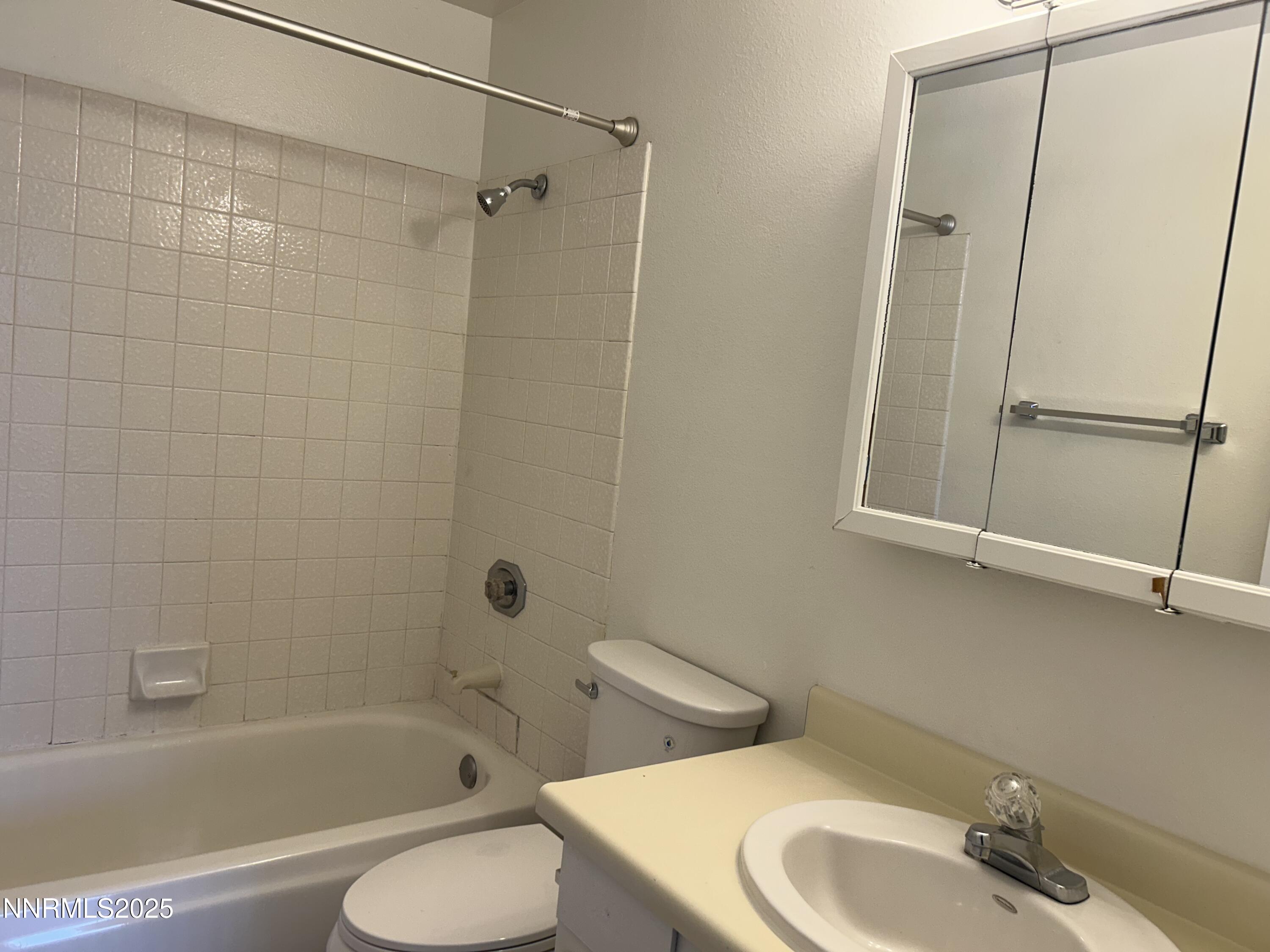 6780 Peppermint Drive Reno, NV 89506 - Photo 10 of 16 a bathroom with a sink toilet and shower