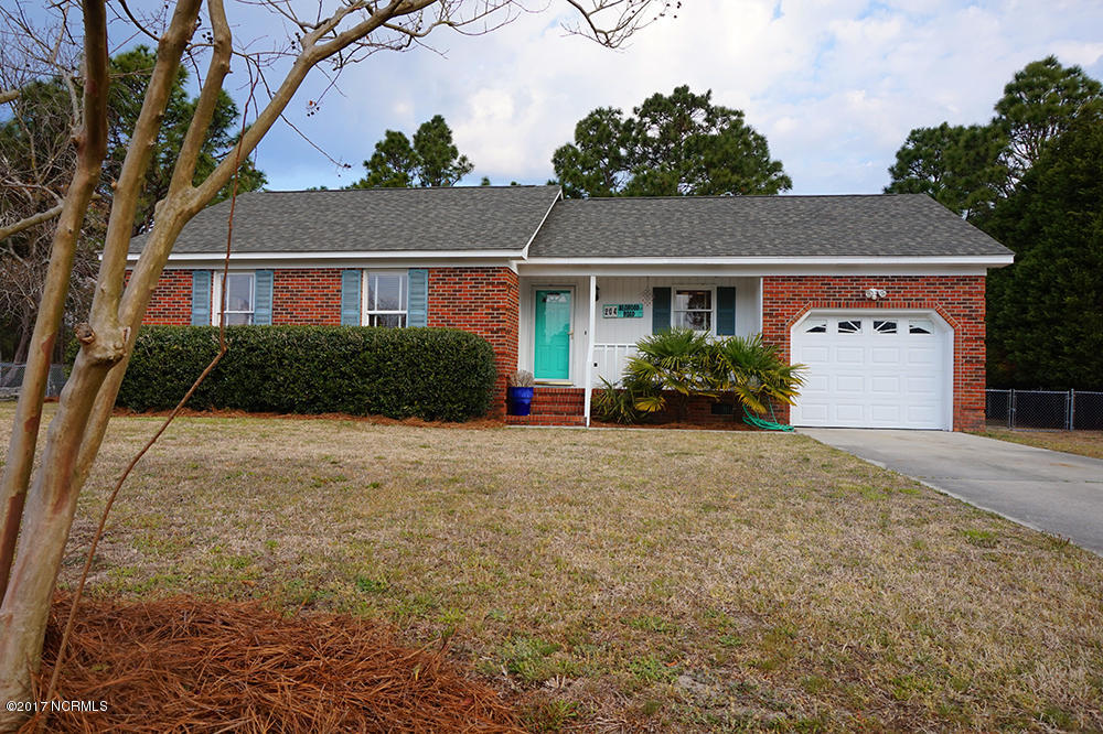 204 Beawood Road Wilmington, NC 28411 - Photo 1 of 29 1-front_of_house_from_tree