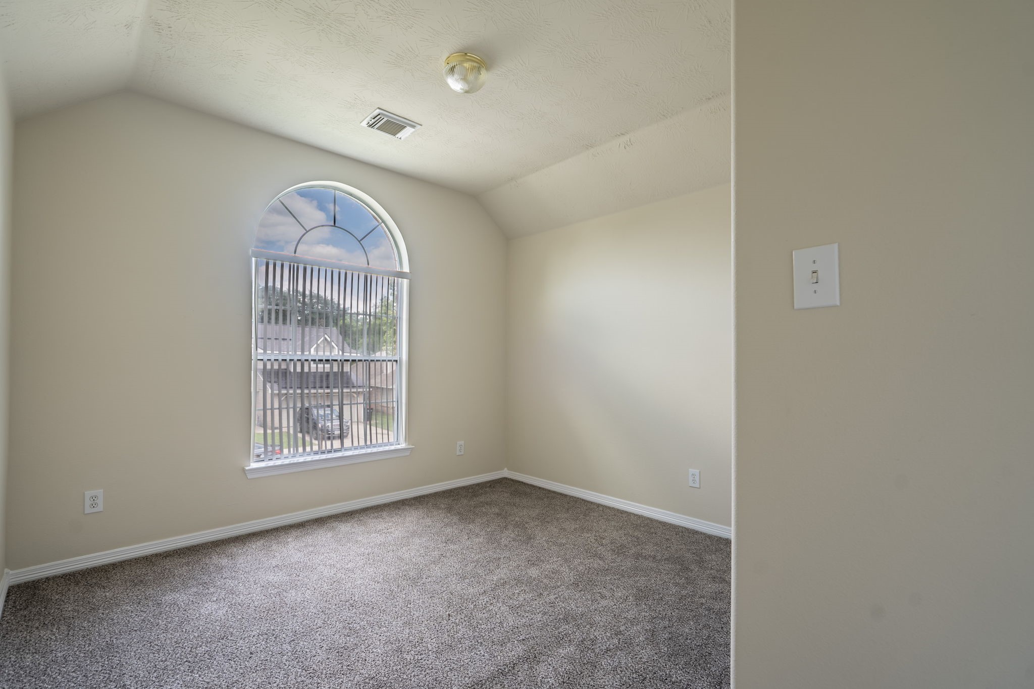 24139 Spring Sunset Drive Spring, TX 77373 - Photo 17 of 26 an empty room with windows