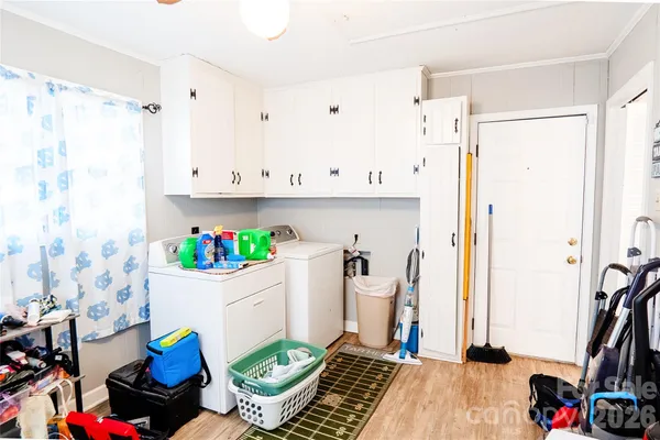 a living room with fireplace furniture and a flat screen tv