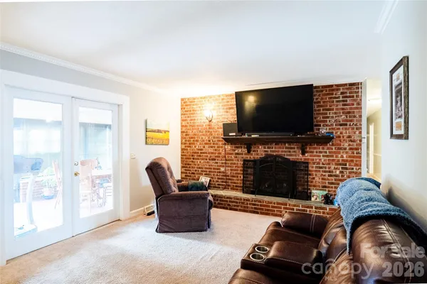 a view of a livingroom with furniture and windows