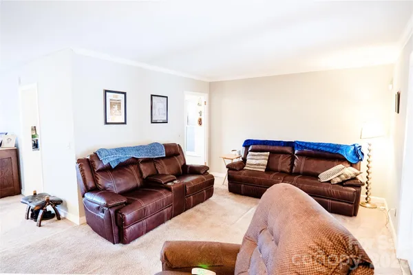 a bedroom with furniture and a couch