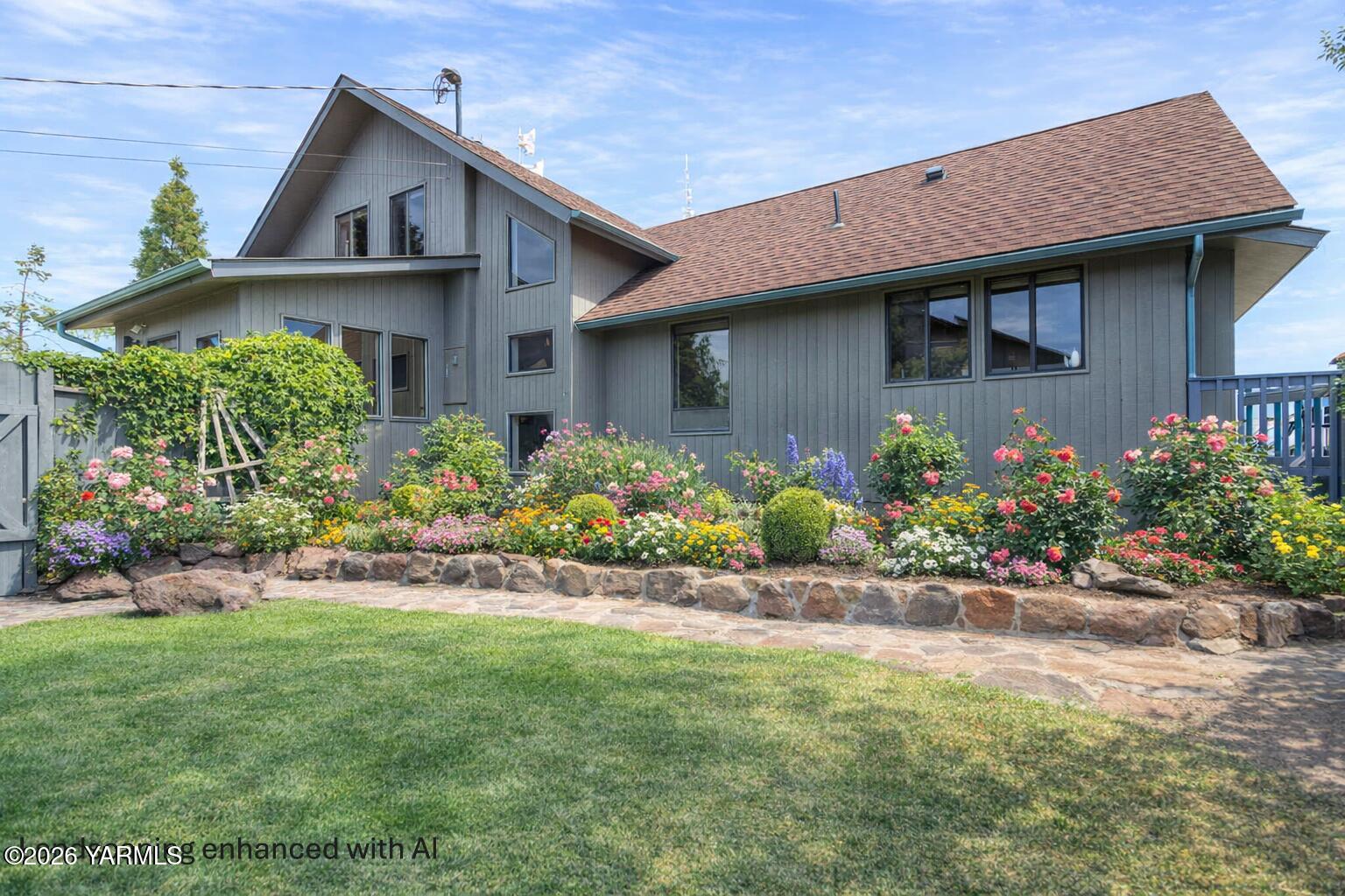 541 Basalt Springs Way Yakima, WA 98908 - Photo 1 of 51 a front view of a house with a yard
