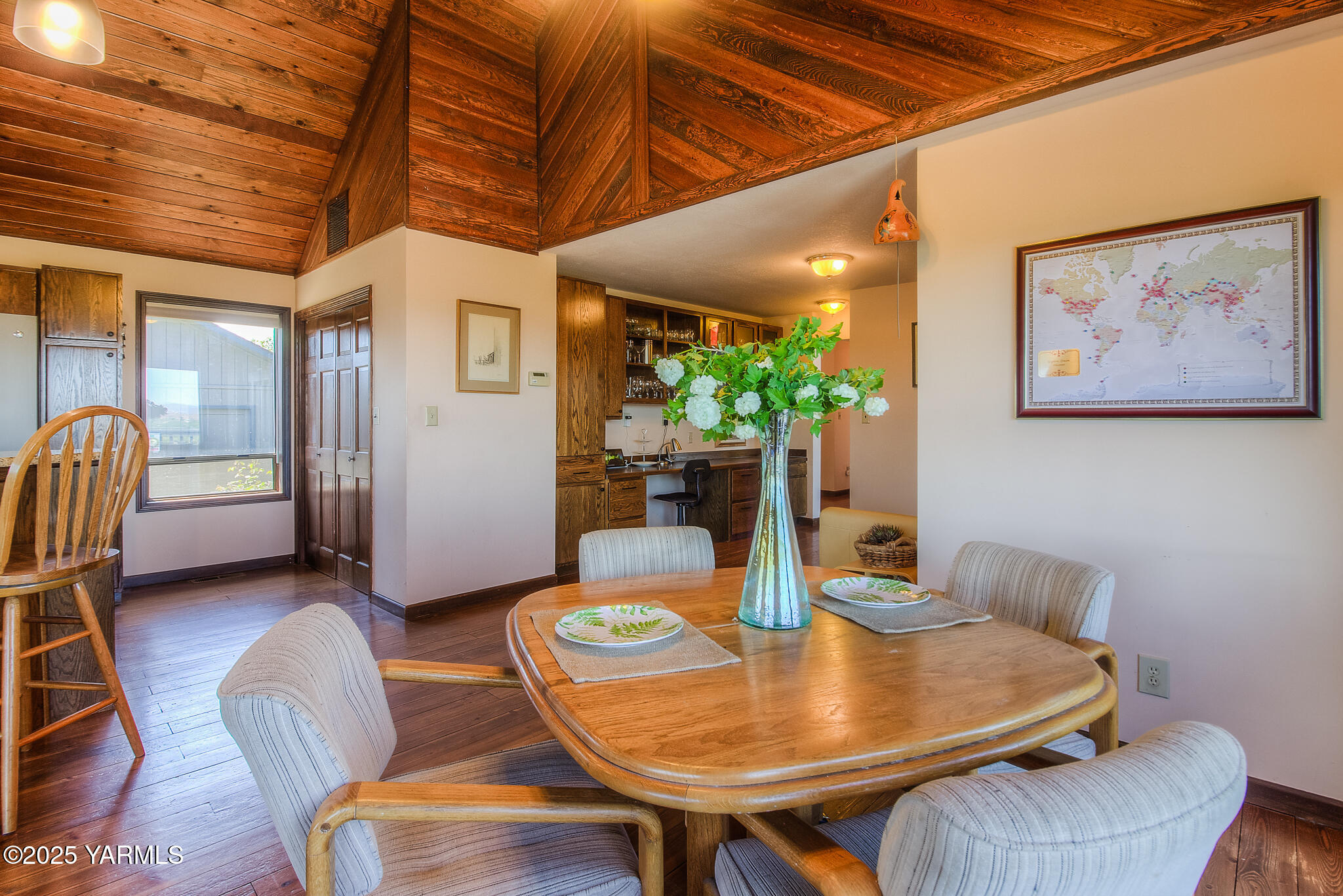 541 Basalt Springs Way Yakima, WA 98908 - Photo 20 of 51 a view of a dining room with furniture window and wooden floor