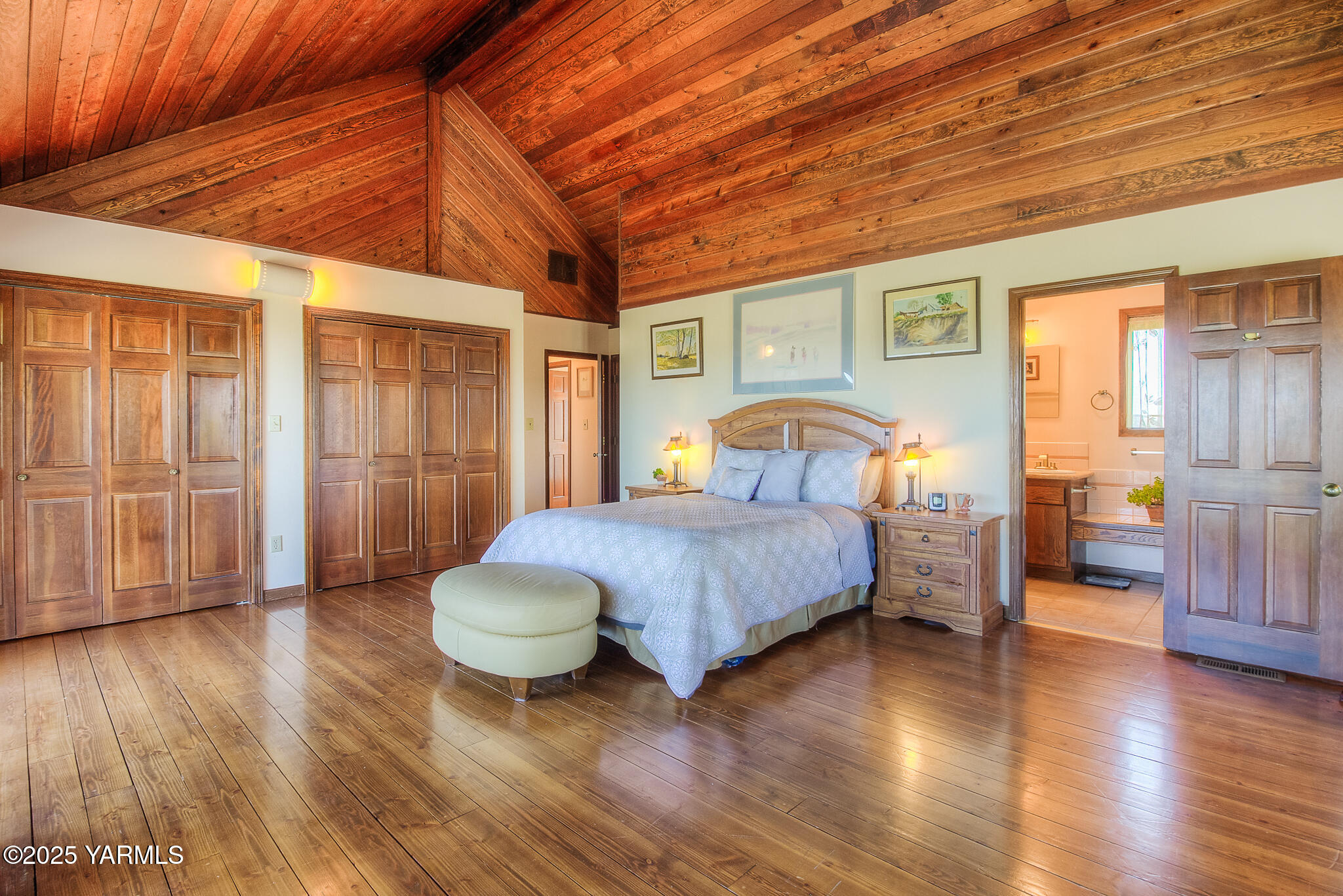 541 Basalt Springs Way Yakima, WA 98908 - Photo 26 of 51 a bedroom with a bed and wooden floor