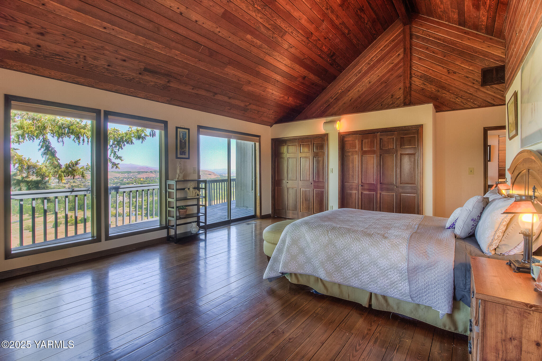 541 Basalt Springs Way Yakima, WA 98908 - Photo 27 of 51 a bedroom with a large bed and a large window
