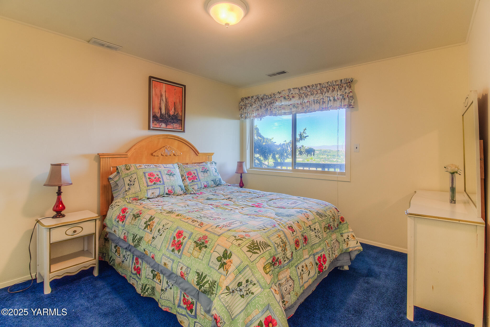 541 Basalt Springs Way Yakima, WA 98908 - Photo 37 of 51 a bedroom with a bed and a window