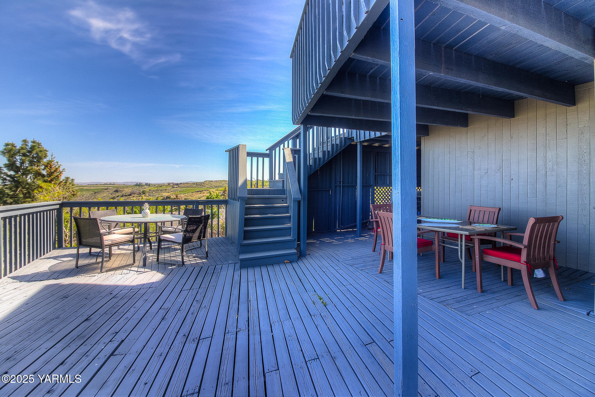 541 Basalt Springs Way Yakima, WA 98908 - Photo 41 of 51 a view of a chairs and table on the wooden deck