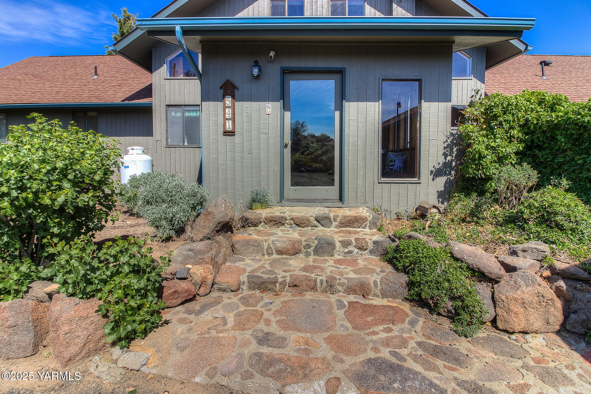 541 Basalt Springs Way Yakima, WA 98908 - Photo 47 of 51 a view of a house with potted plants