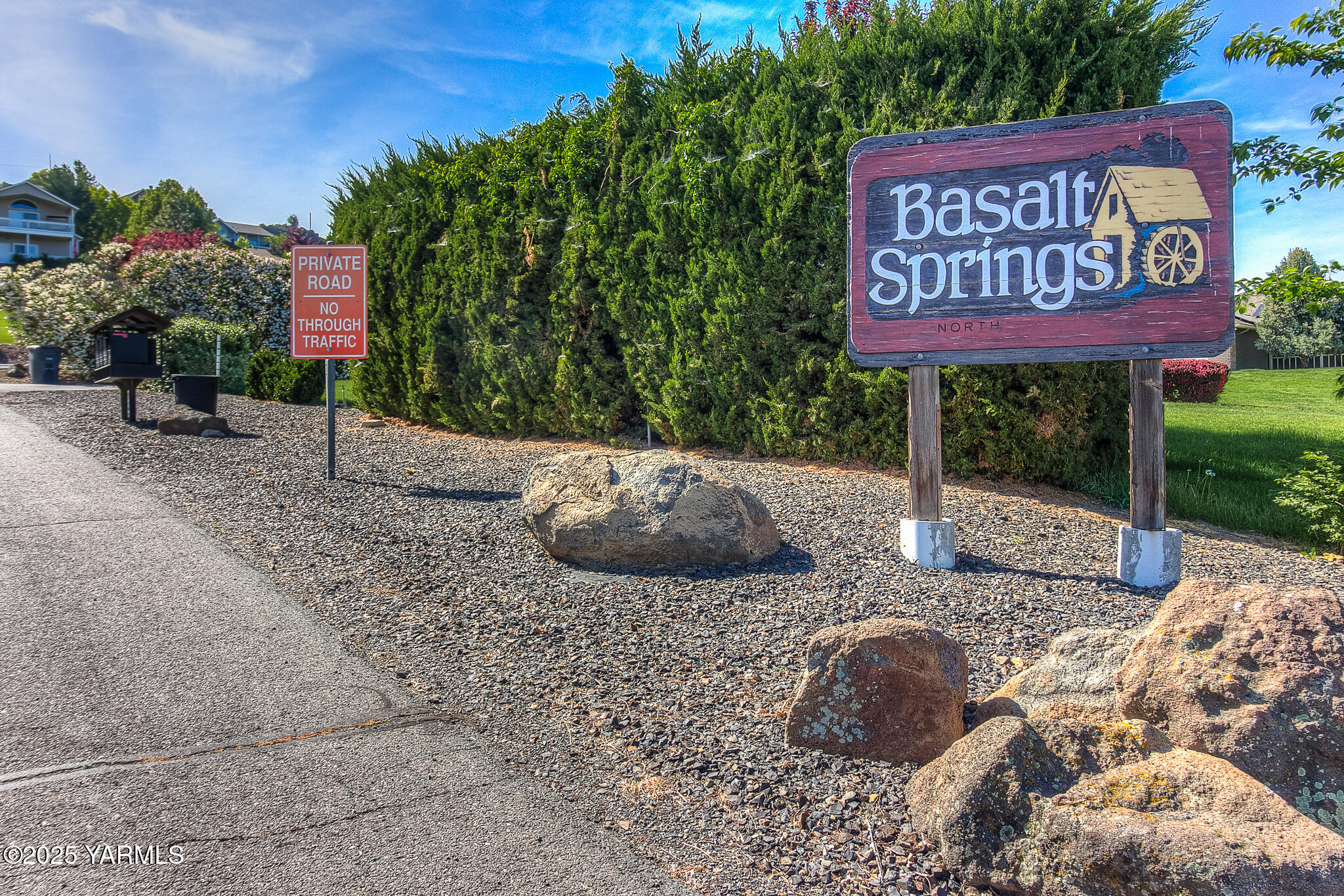 541 Basalt Springs Way Yakima, WA 98908 - Photo 50 of 51 a sign that is on the side of the road