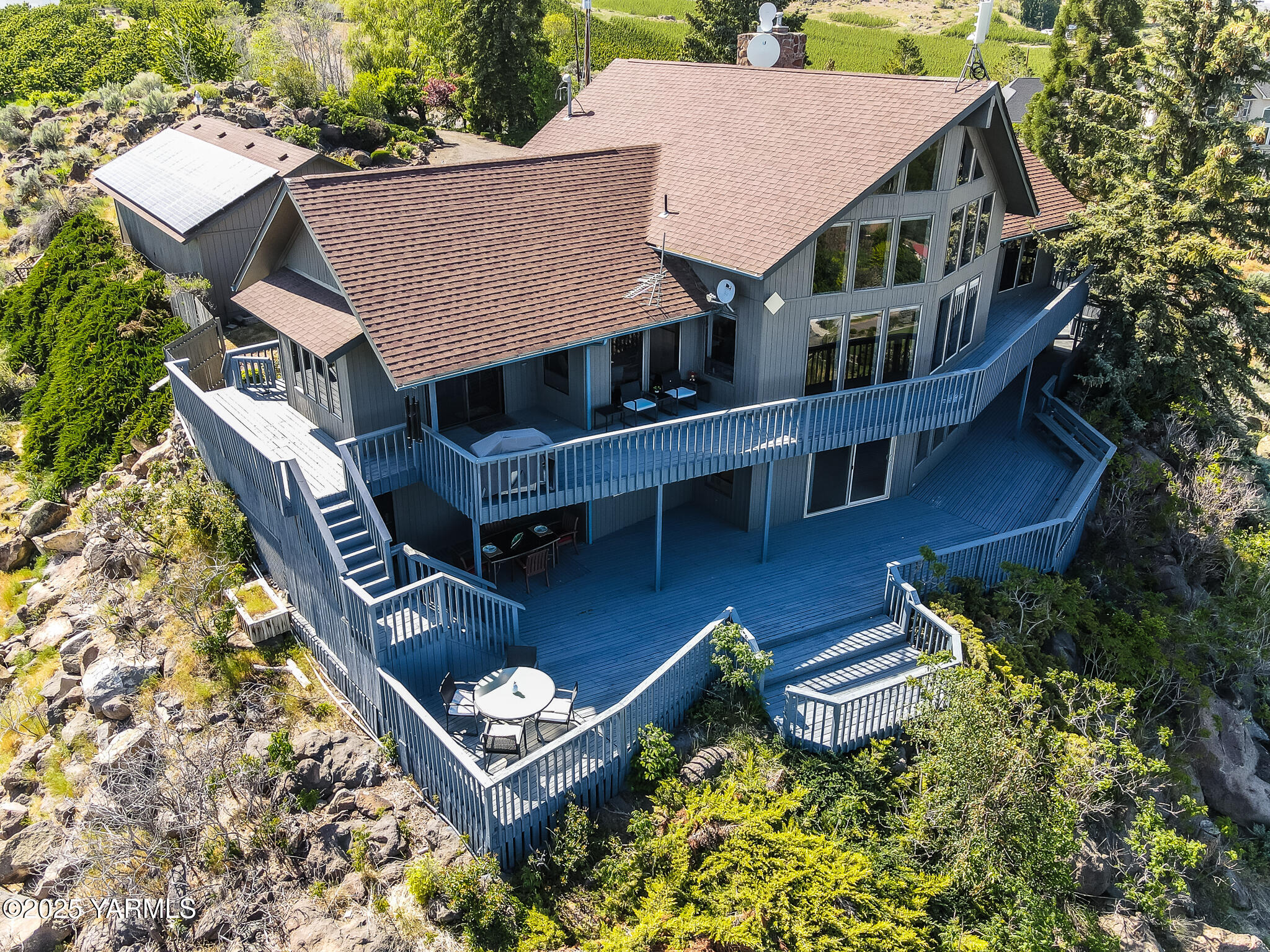 541 Basalt Springs Way Yakima, WA 98908 - Photo 5 of 51 an aerial view of a house with table and chairs