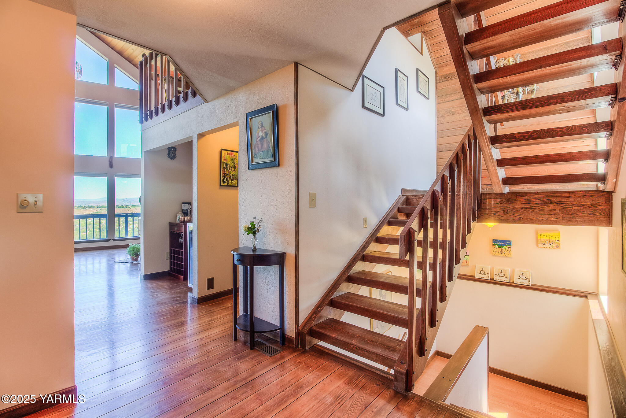 541 Basalt Springs Way Yakima, WA 98908 - Photo 9 of 51 a view of entryway with wooden floor and stairs