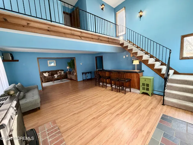 a view of livingroom with furniture and staircase