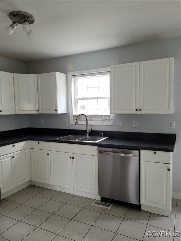 2315 Raleigh Street Hopewell, VA 23860 - Photo 8 of 25 Kitchen featuring dishwasher, light tile patterned