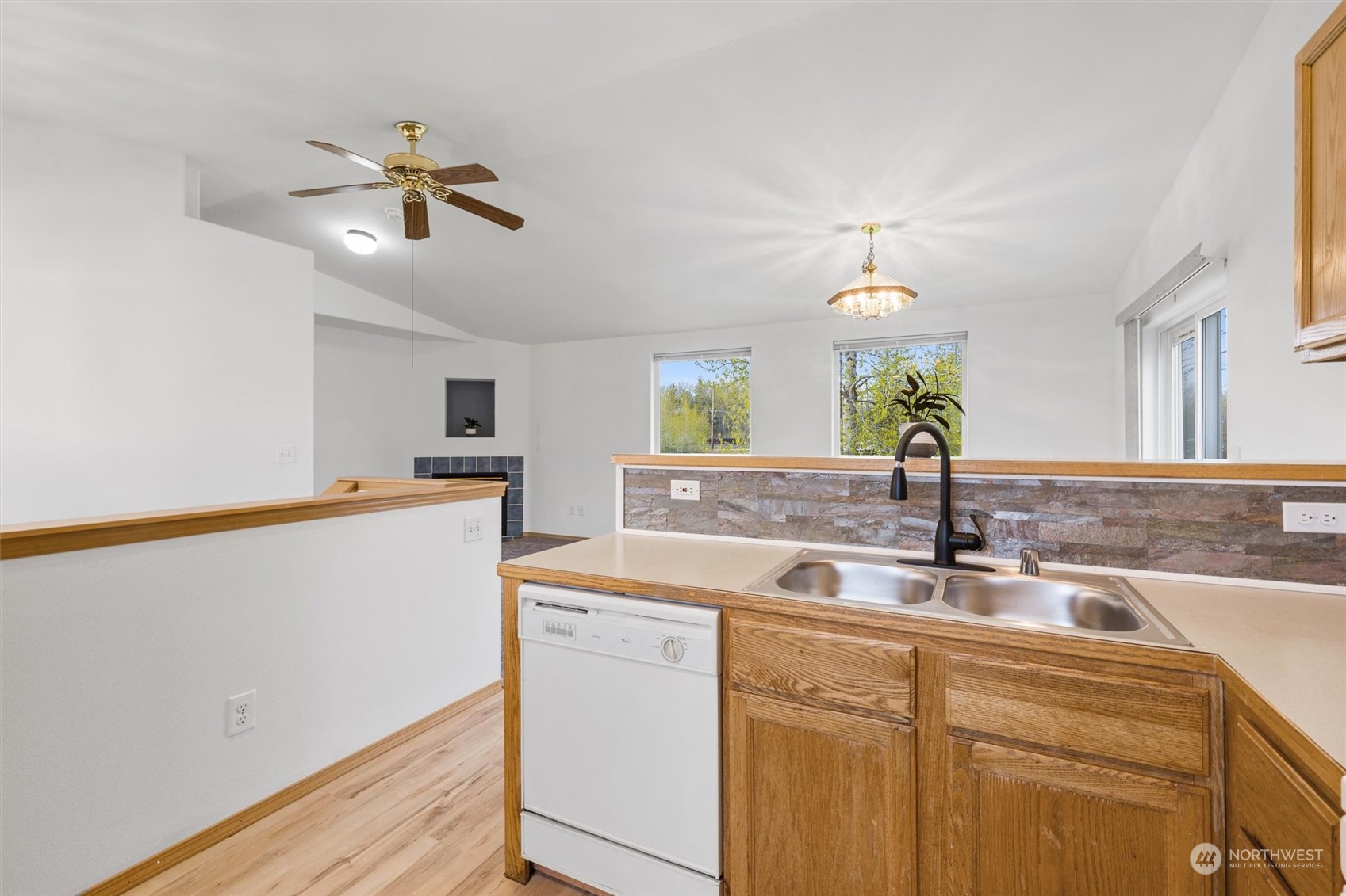 219 Nugget Road Gold Bar, WA 98251 - Photo 5 of 39 a kitchen with a sink cabinets and window