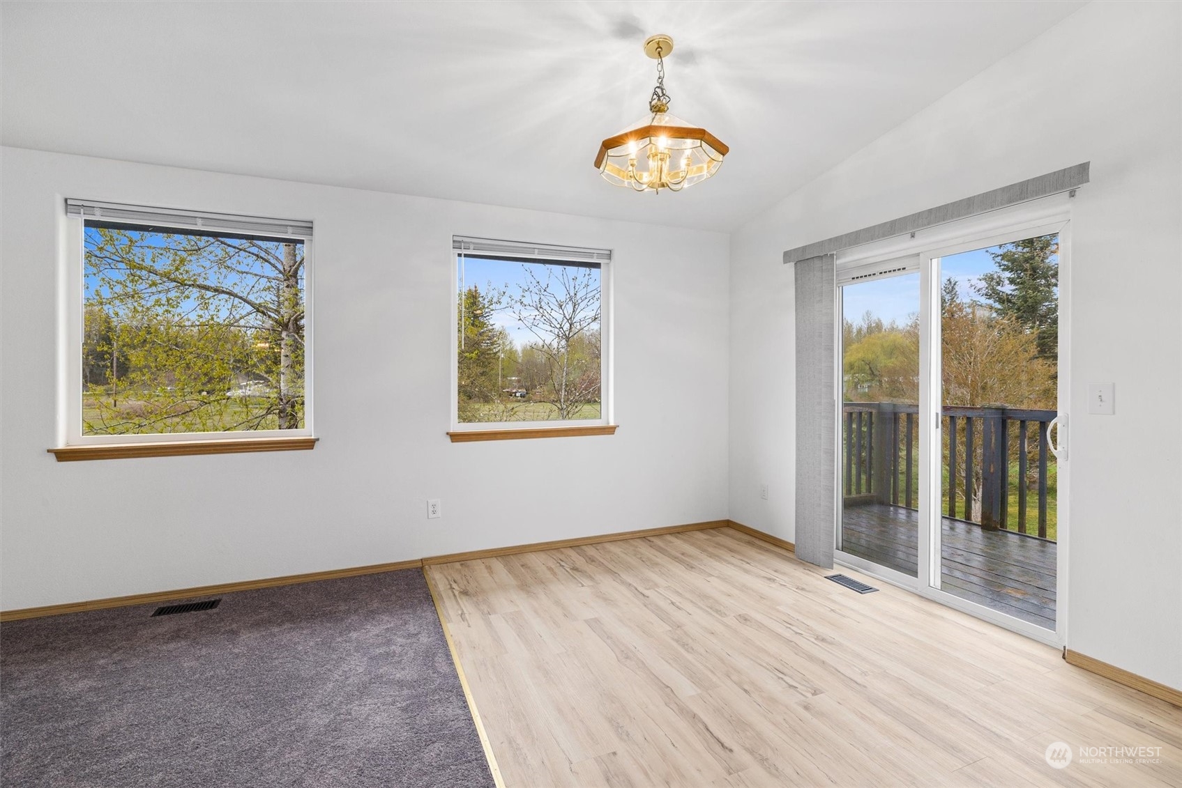 219 Nugget Road Gold Bar, WA 98251 - Photo 9 of 39 a view of an empty room with window wooden floor