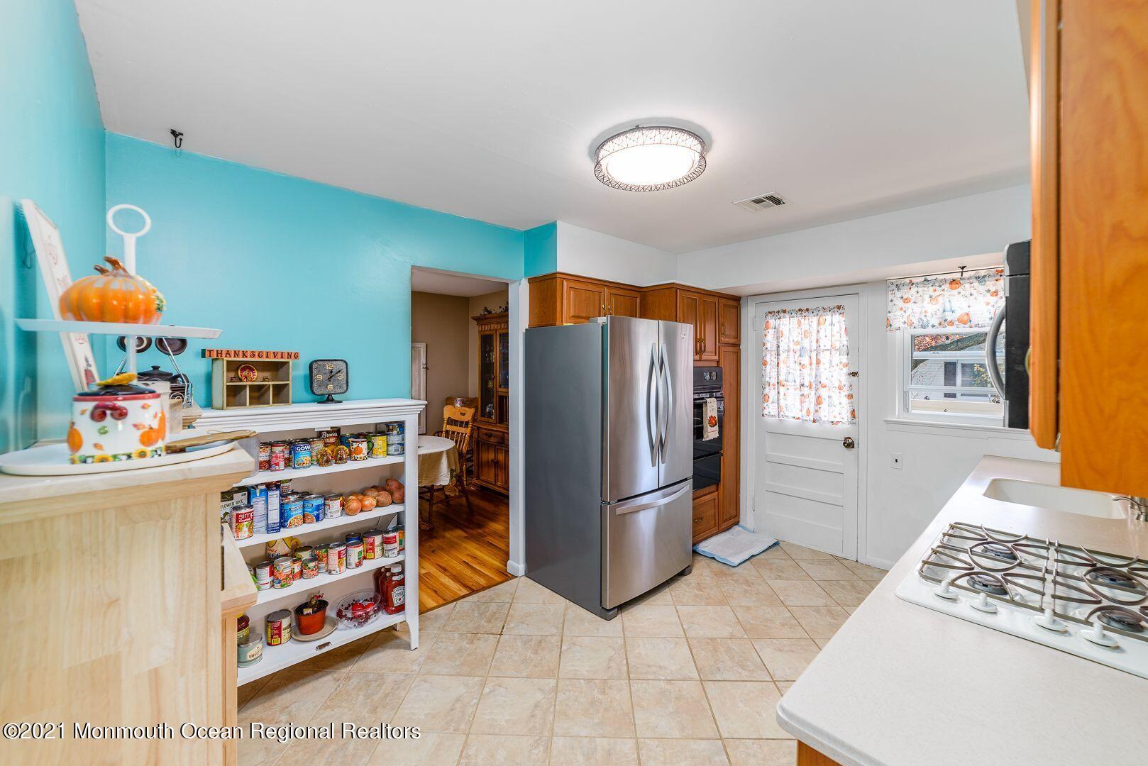 125 Jordan Road Brick, NJ 08724 - Photo 12 of 28 a kitchen with stainless steel appliances granite countertop a refrigerator and a sink