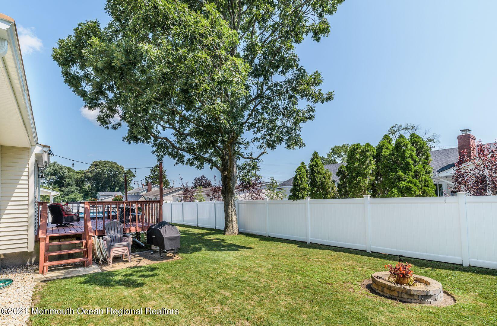 125 Jordan Road Brick, NJ 08724 - Photo 26 of 28 a backyard of a house with lots of green space