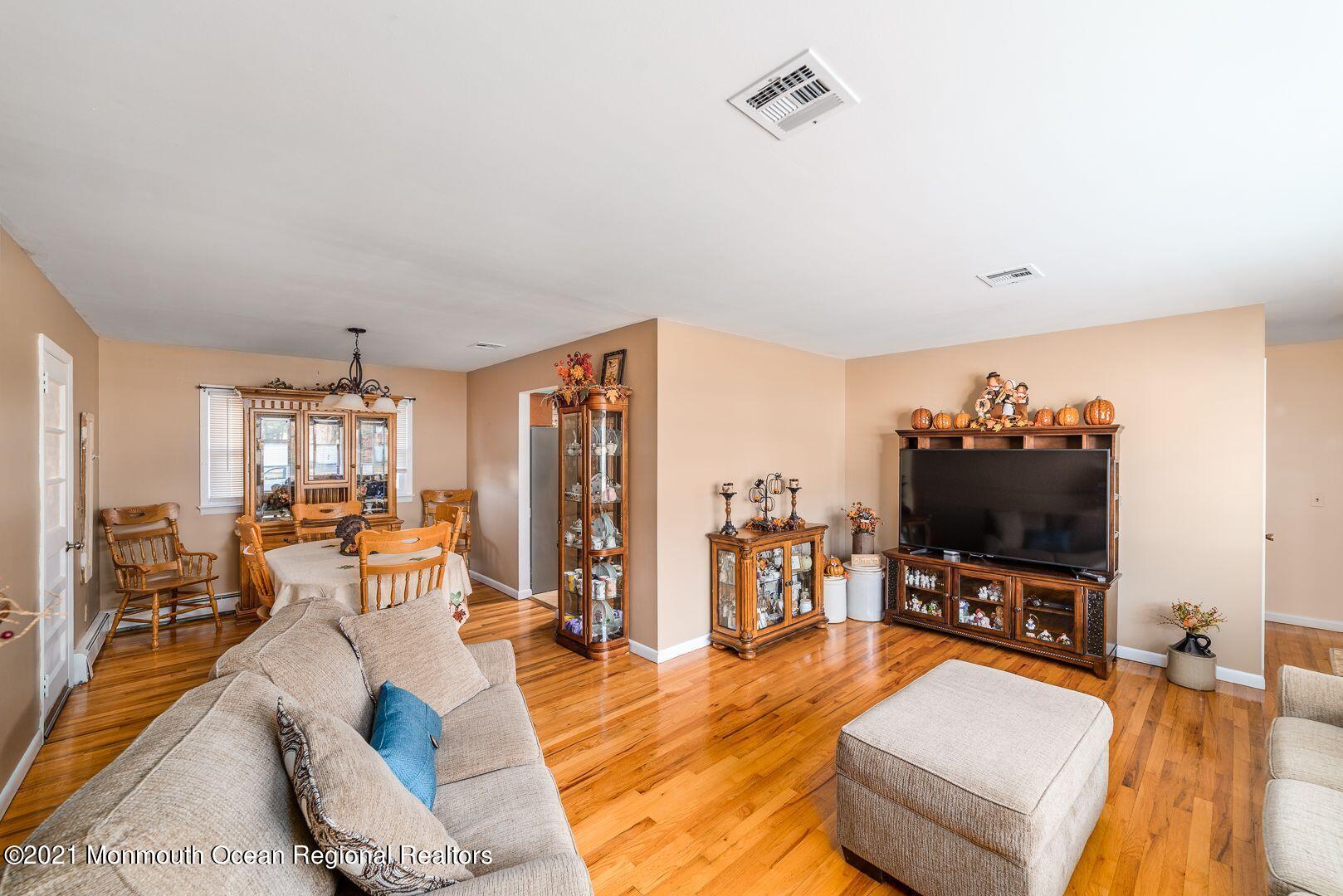 125 Jordan Road Brick, NJ 08724 - Photo 4 of 28 a living room with furniture and a flat screen tv