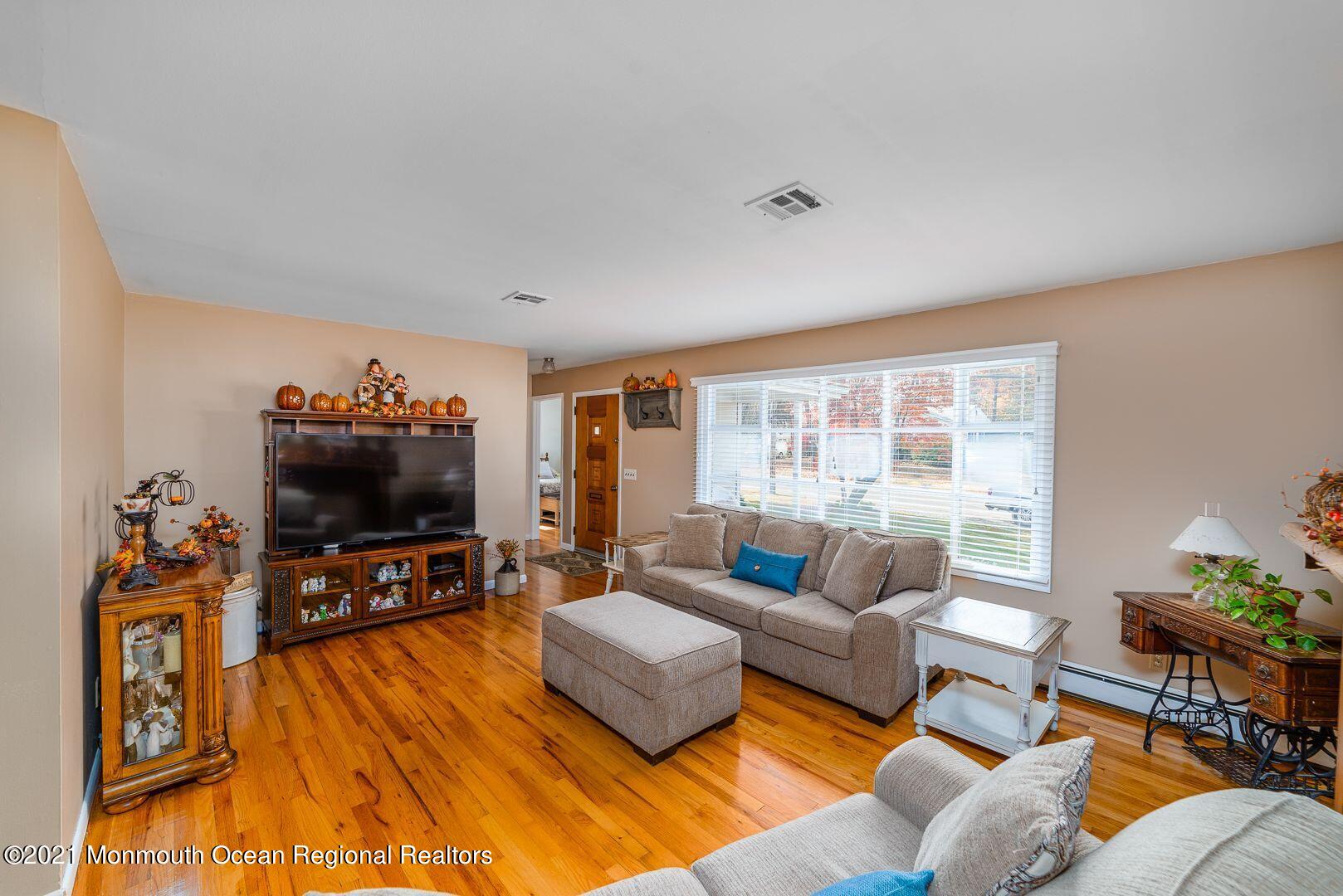 125 Jordan Road Brick, NJ 08724 - Photo 6 of 28 a living room with furniture and a flat screen tv