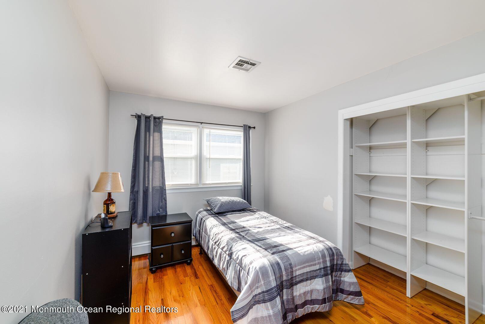 125 Jordan Road Brick, NJ 08724 - Photo 8 of 28 a bedroom with a bed and a window