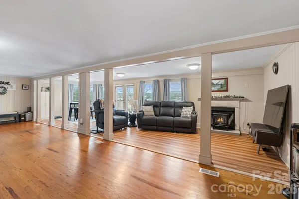 a kitchen with cabinets a sink and stainless steel appliances