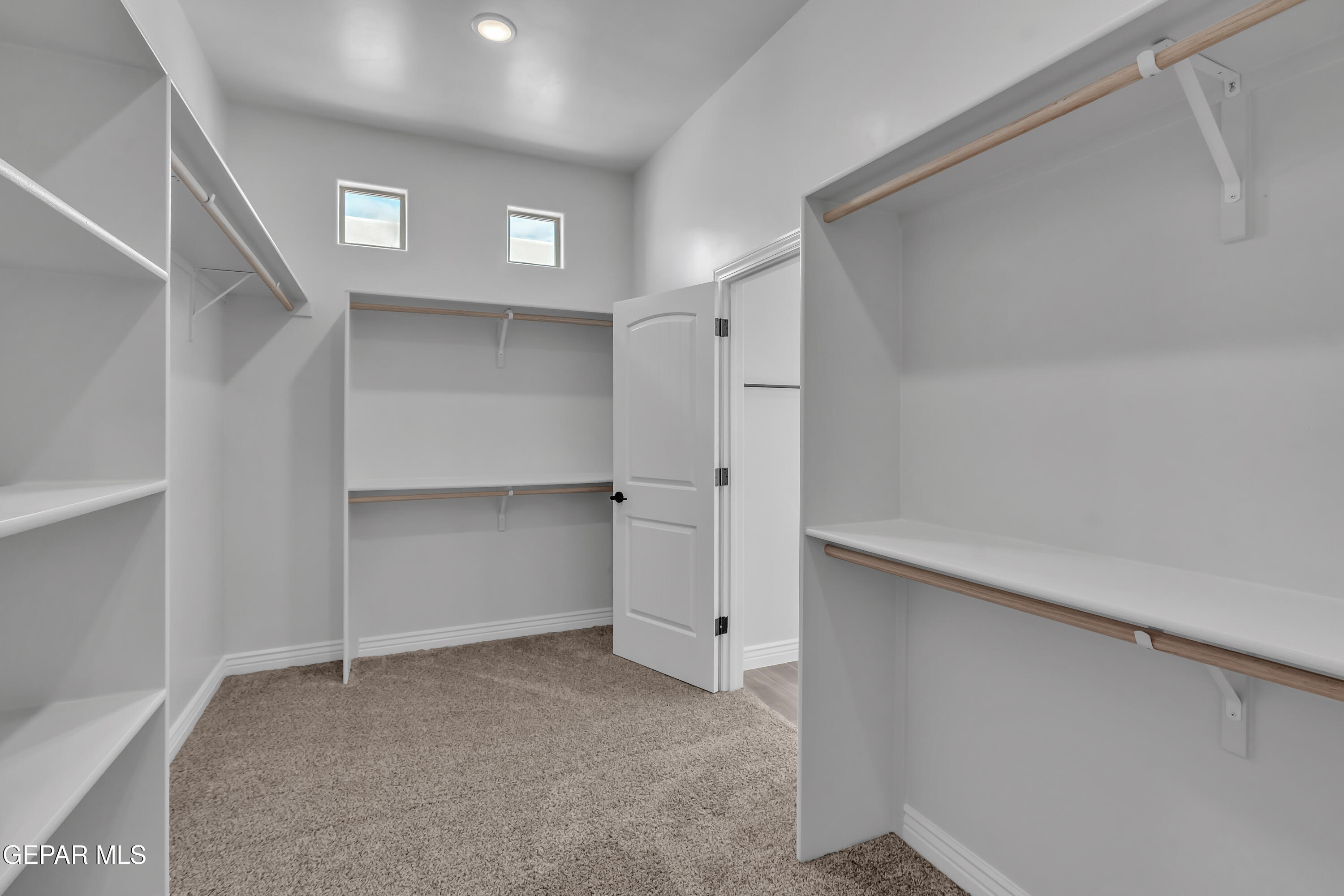 1849 War Path El Paso, TX 79911 - Photo 14 of 18 a view of an empty walk in closet