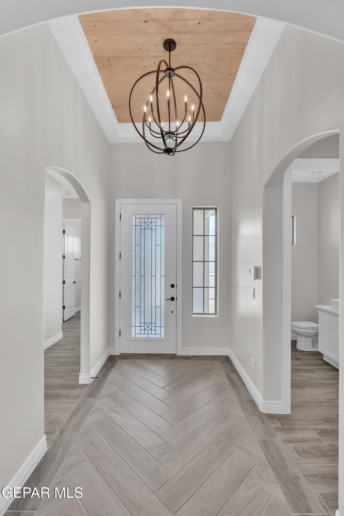 1849 War Path El Paso, TX 79911 - Photo 3 of 18 wooden floor in an empty room with a window