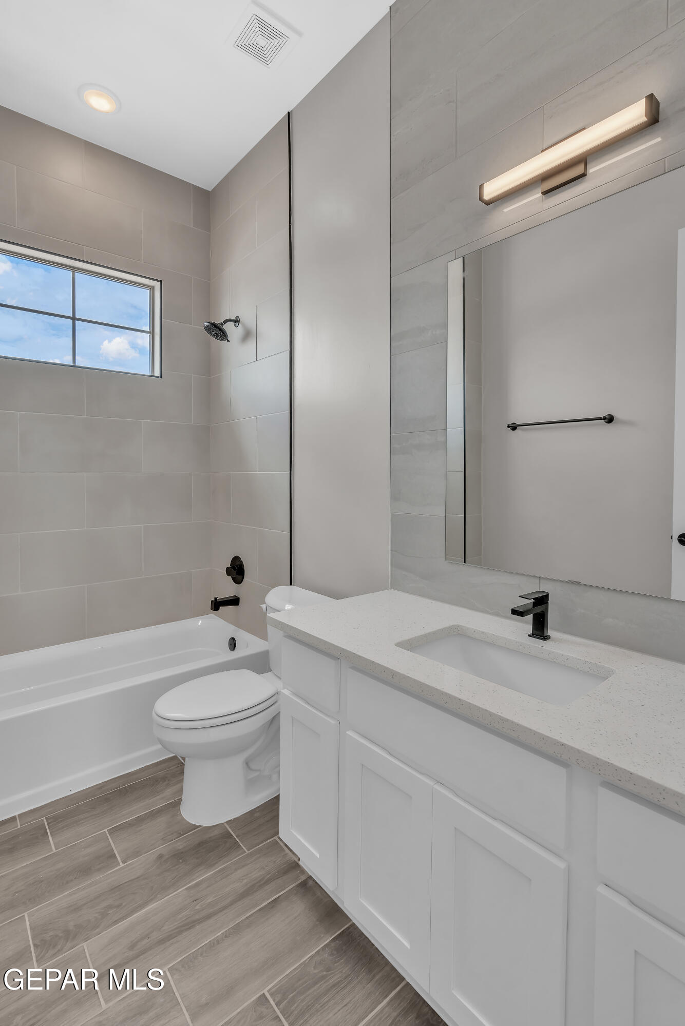 1849 War Path El Paso, TX 79911 - Photo 4 of 18 a bathroom with a sink a toilet and shower