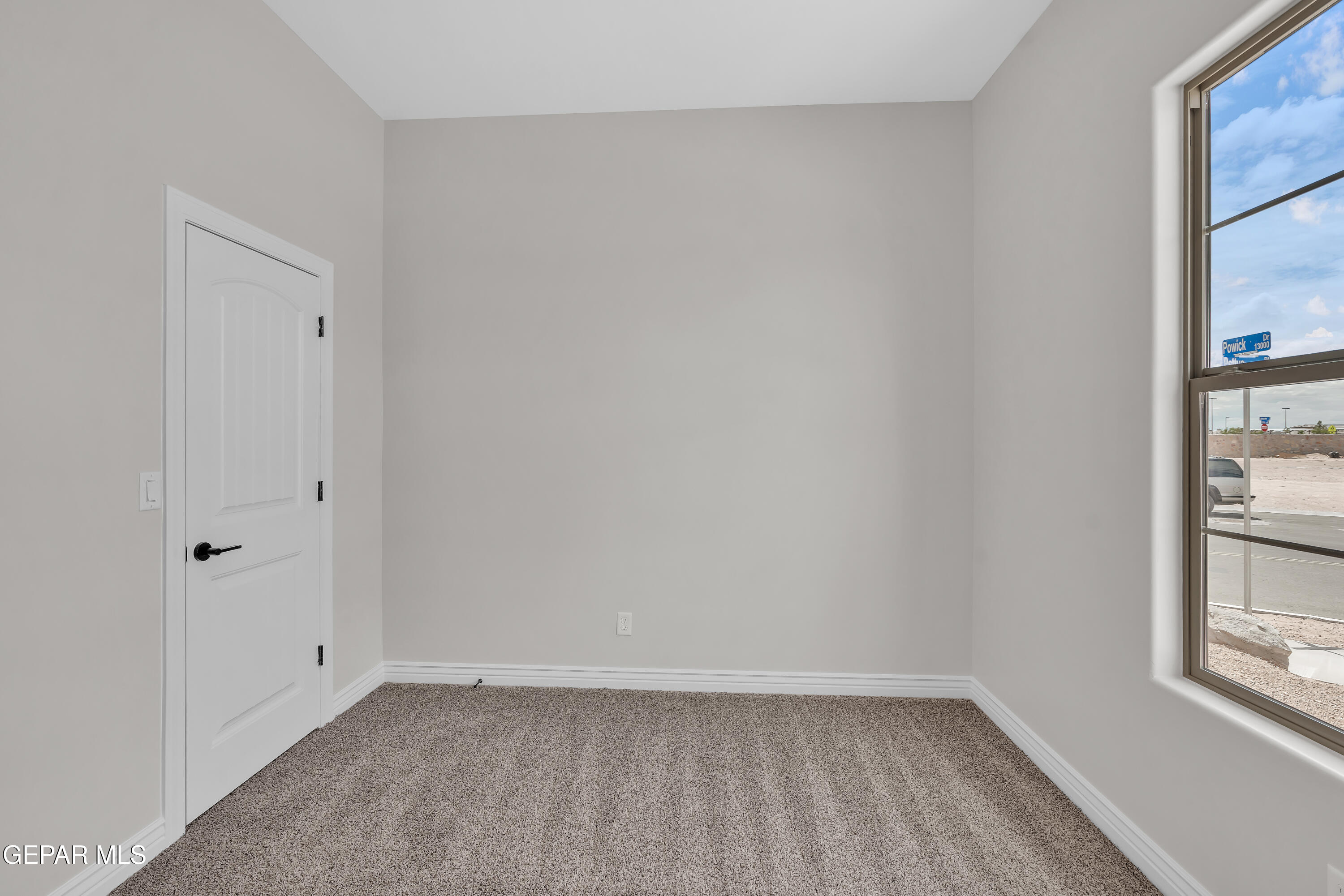 1849 War Path El Paso, TX 79911 - Photo 5 of 18 a view of an empty room with a window