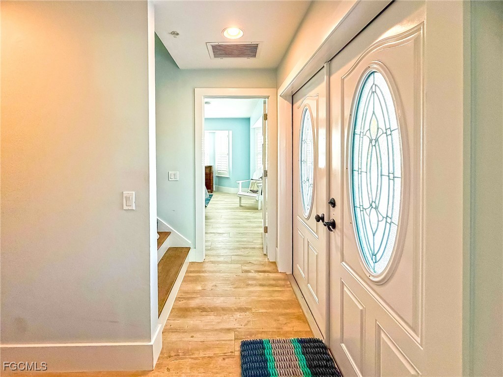 4560 Conch Shell Drive Upper Captiva, FL 33924 - Photo 14 of 50 a view of gallery with wooden floor