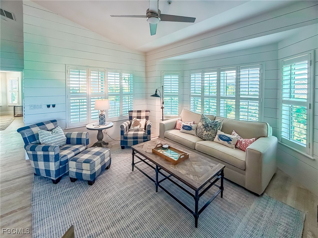 4560 Conch Shell Drive Upper Captiva, FL 33924 - Photo 38 of 50 a living room with furniture and a large window