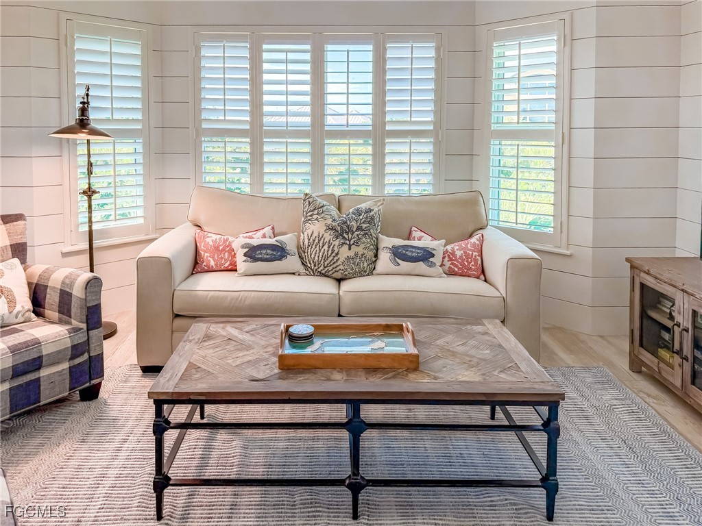 4560 Conch Shell Drive Upper Captiva, FL 33924 - Photo 41 of 50 a living room with furniture and a window