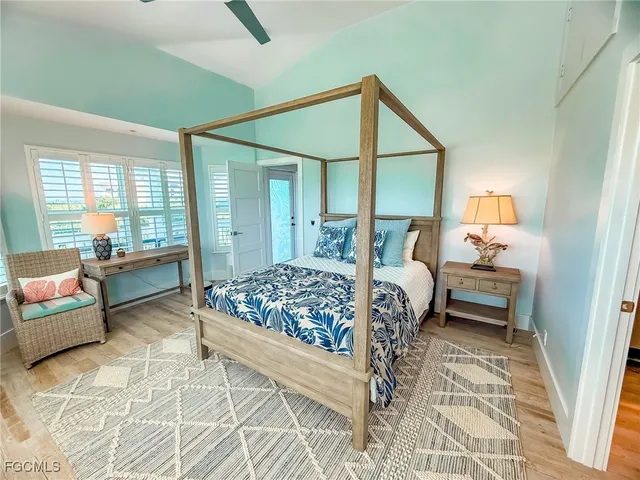 a bed room with a bed and a couch