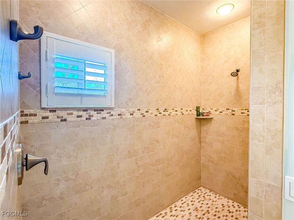 4560 Conch Shell Drive Upper Captiva, FL 33924 - Photo 47 of 50 a bathroom with a shower