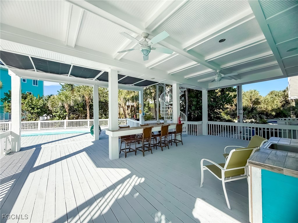 4560 Conch Shell Drive Upper Captiva, FL 33924 - Photo 9 of 50 a view of a dining room with furniture window and outside view