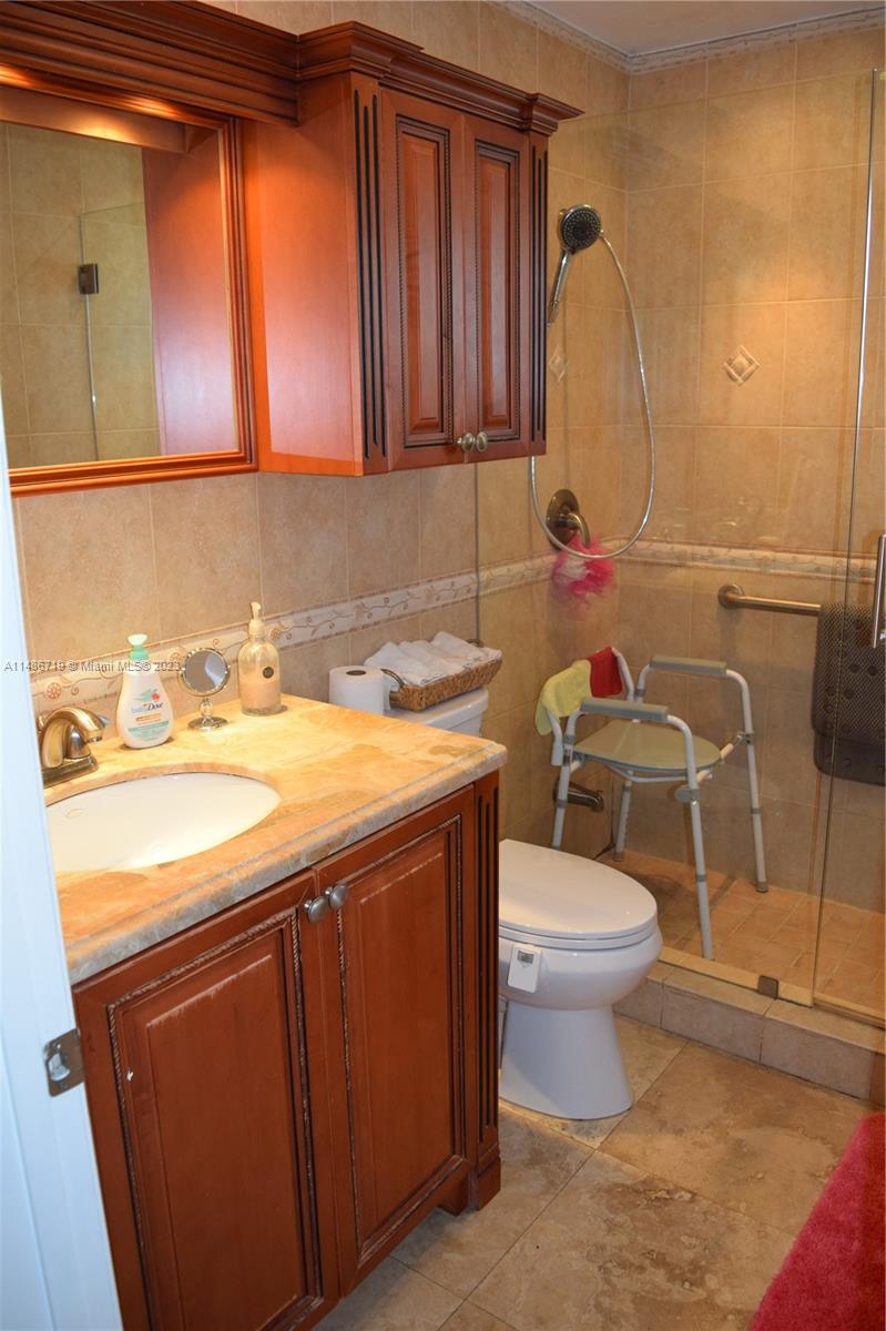 Palmetto Estates Miami, FL 33157 - Photo 15 of 20 a bathroom with a sink and a toilet